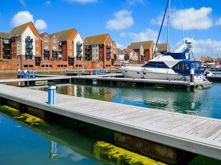 Fototapeta na wymiar Yachts moored in the Sovereign Harbour Marina, Eastbourne, East Sussex, England (UK)