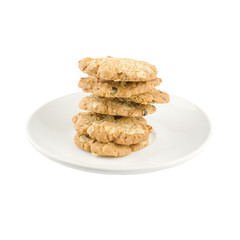 whole grains cookies on White plate isolated on white background