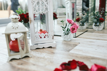 White table set for dinner with empty wineglasses