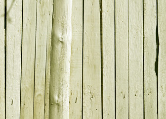 Obraz premium Yellow wooden fence texture.
