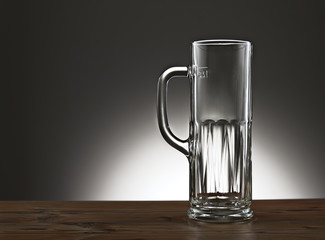 beer glass on a wooden board.