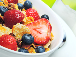 Breakfast bowl with cereals and fresh fruits. 