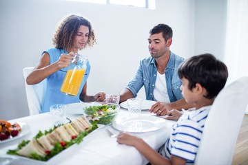 Family sitting at breakfast table