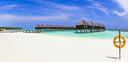 luxury holidays in Maldives island, panoramic view with water bungalows