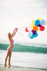Beautiful woman holding balloon