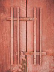 Red Wooden door with handle texture background
