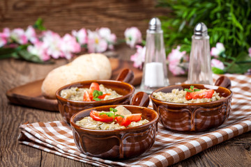 Fried cabbage greens and onion in wooden table.