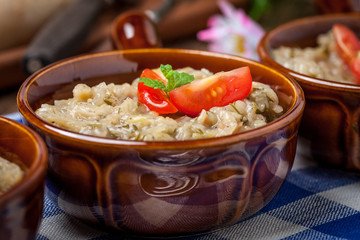Fried cabbage greens and onion in wooden table.