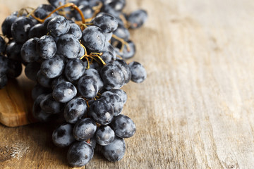 Grapes on wooden background
