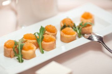 Served table with food snaks.