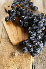 Grapes on wooden background
