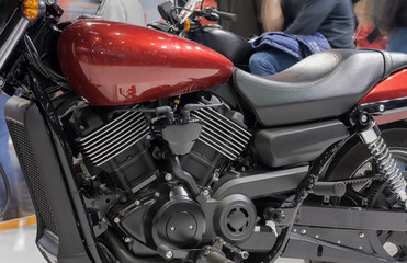 Close up of liquid cooled V-twin engine of motorcycle