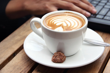 A cup of cappuccino close up