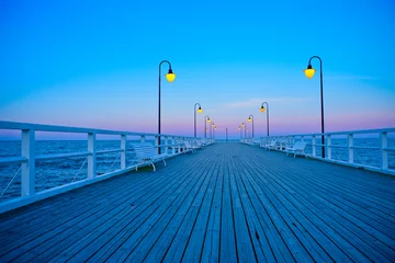 Photo sur Plexiglas Jetée Beautiful wooden pier at sunset