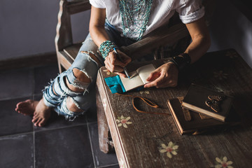 Woman drawing in sketchbook