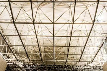 Steel construction of an airport terminal at night, HDR
Structure of steel frame construction. Frankfurt Airport Terminal 2. 
