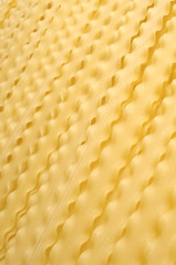uncooked pasta texture on table