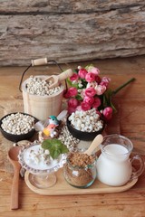 Cooked millet seeds with milk and sugar.