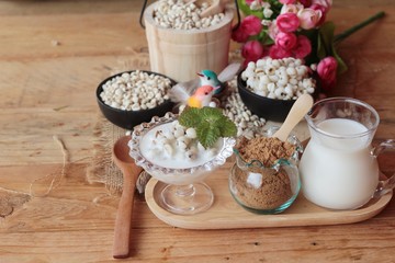 Cooked millet seeds with milk and sugar.