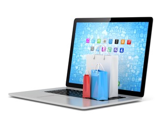 laptop and  shopping pags on white background. 3d rendering.