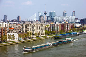 Rotterdam, Netherlands, cargo vessel and seafront modern port 