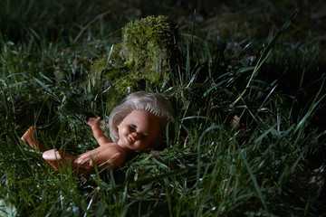 Scary doll. Child abuse. Crime scene