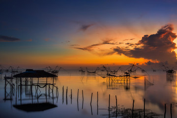 Sunrise over Pak Pra lake in Phatthalung,Thailand