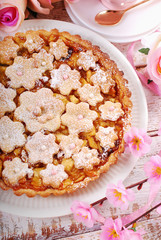 homemade apple pie with cut out spring flowers