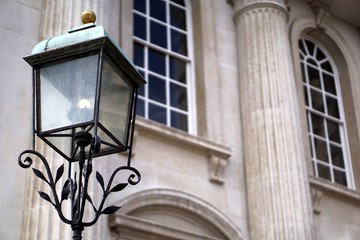 Fototapeta na wymiar Old-Fashioned Street Lamp, Senate House, Cambridge, England
