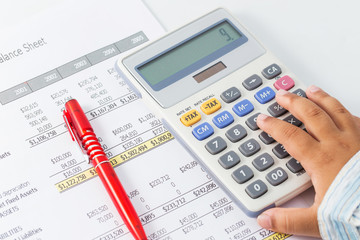 Finance budget report with hand of someone