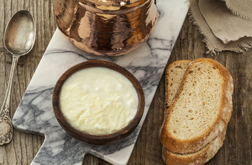 Homemade yogurt on wooden table