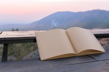 Big brown notebook blank open on terrace