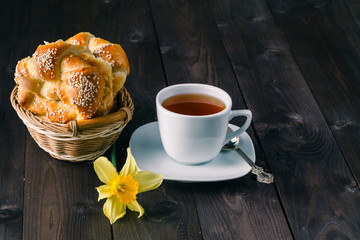 Cup of tea with flowers on the table