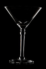 Martini glass on black background abd rim lighting