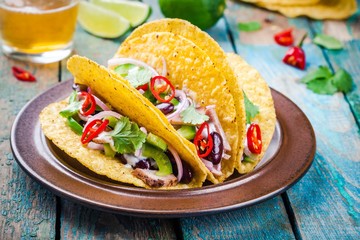 corn tacos with pork and vegetables