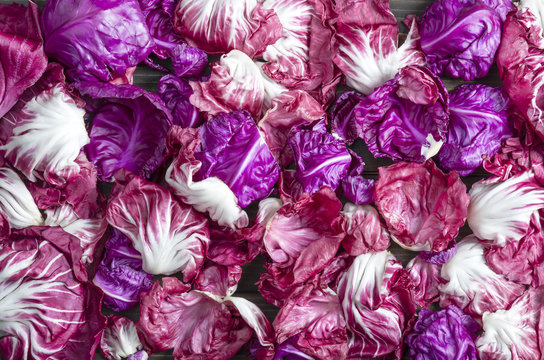 Purple cabagge and red chicory leaves background