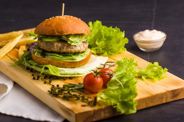 gourmet homemade burger with garnish