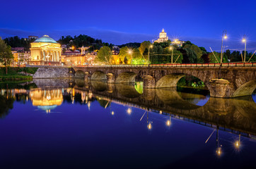 Fototapeta na wymiar Turin (Torino) river Po Grand Madre and Monte dei Cappuccini at blue hour