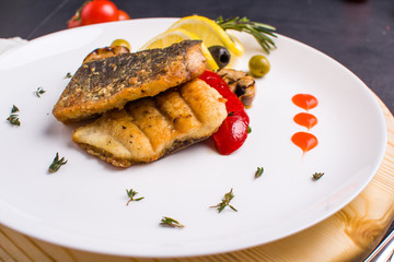 Grilled fish steak with vegetables