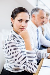 Portrait of businesswoman in meeting