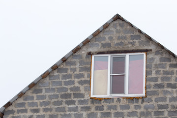window in a new brick house