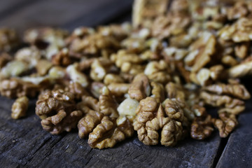 peeled walnut on a wooden background