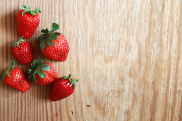 strawberries top on wooden background
