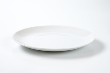 Coup shaped white plate © Viktor
