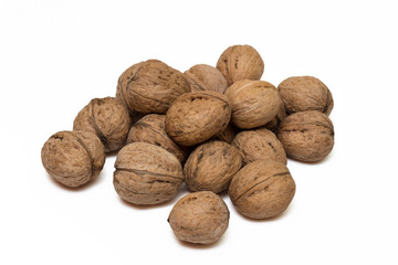 Горсть орехов на белом