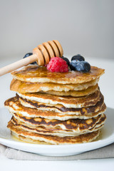 American pancakes with raspberries and blueberries
