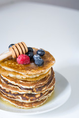 American pancakes with raspberries and blueberries
