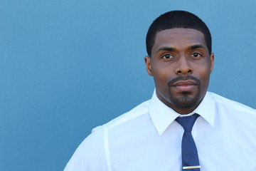 Portrait of a handsome young African man in a suit