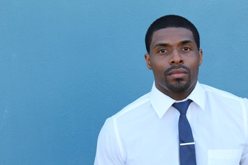 Black young African businessman looking serious