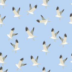 seamless background with white seagulls against blue sky